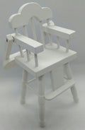 white highchair in miniature on a white background 